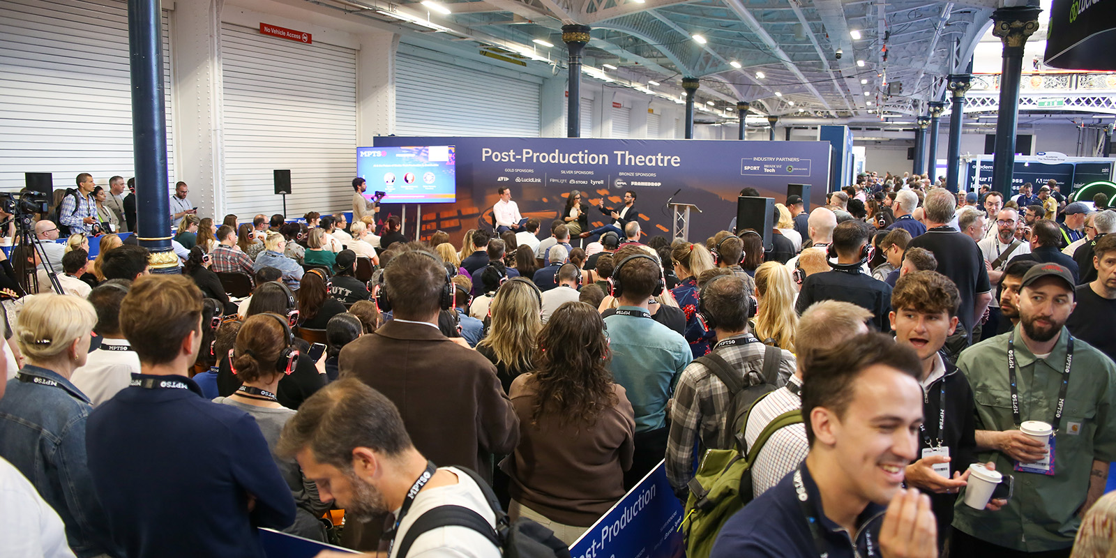 A packed audience engaged in a post-production session at MPTS 2026.